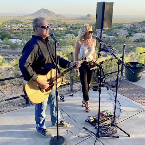 Live music duo by the mountains on stage in Socttsdale AZ